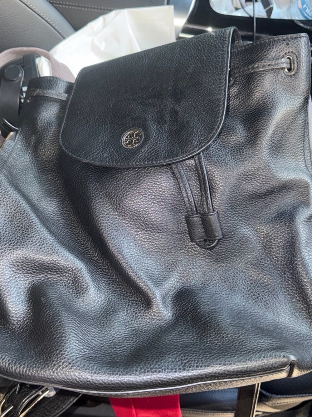 Tory Burch Black Pebbled Leather Drawstring Backpack with Logo Flap